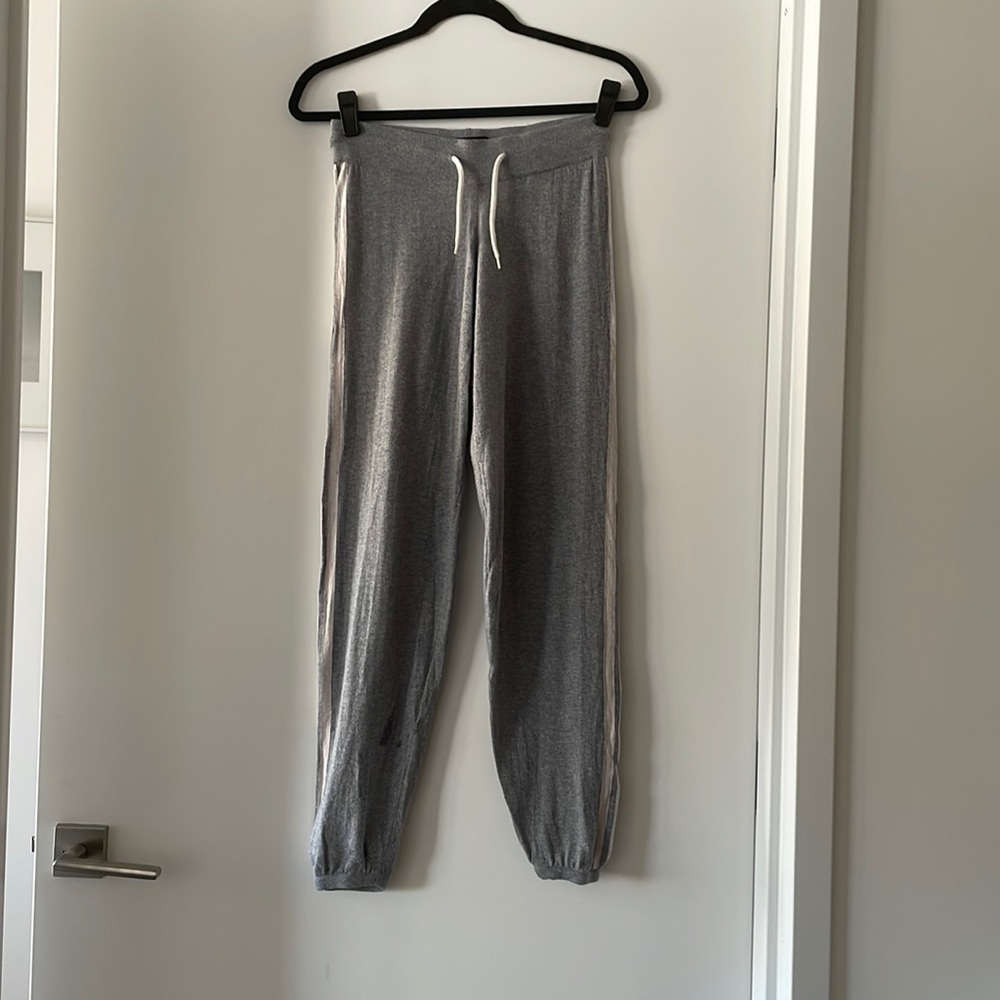 Monrow jogger style sweats with two white stripes down the side.